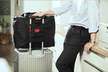 (Black) กระเป๋าเดินทางพับได้ อเนกประสงค์ เพื่อการเดินทาง ท่องเที่ยว เสียบที่จับของกระเป๋าเดินทางได้ รูปที่ 1