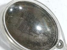 เหรียญพระพุทธรูปเจ้าตาเขียว วัดบ้านเหล่า จ.ลำพูน รุ่นปิดทอง ปี2534 รูปที่ 4