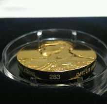 เหรียญบรอนซ์สวิส รัชกาลที่9 (พฤติกรรมการ) รูปที่ 4