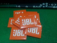 โลโก้ JBL พลาสติคเคลือบนูนสีส้ม รูปที่ 1