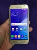 ขาย Samsung Galaxy J2 สีทอง ตัวเครื่องภายนอกดูตามรูปที่ลงเอาไว้เลยนะ การใช้งานปกติทุกอย่าง รีเซ็ตได้ตลอด ไม่ติดรหัสใดๆ รูปที่ 1