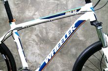 (รูปจริง) ขายจักรยานเสือภูเขา Wheeler Pro30 เฟรมอลูมิเนียม โช้คปรับระดับล็อคได้  กะโหลกแบริ่ง รูปที่ 3