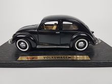 ขายโมเดลรถ VW Beetle เต่าจอแบ่ง สีดำ ขนาด 1ต่อ18 คันใหญ่ ทำจากเหล็ก งานTchibo Maisto รูปที่ 3