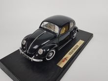 ขายโมเดลรถ VW Beetle เต่าจอแบ่ง สีดำ ขนาด 1ต่อ18 คันใหญ่ ทำจากเหล็ก งานTchibo Maisto รูปที่ 1