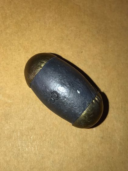 ลูกสะกด จารมือ เนื้อตะกั่วเก่า สีจืด ผิวเดิม หุ้มหัวท้ายเป็นทองเหลือง ตอกโค๊ตเลข 3 สองตัว แท้ เก่า แลก หายาก ไม่้รู้ที่  รูปที่ 2