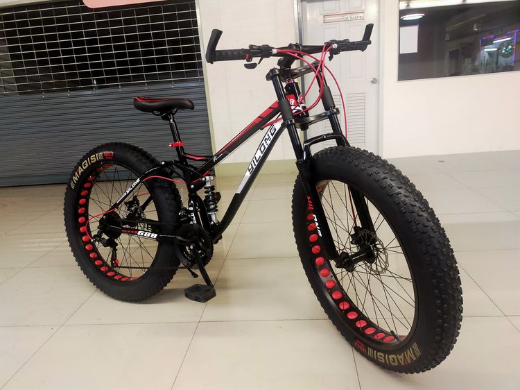 จักรยานล้อโต มีโช๊คหน้า-หลัง ดีไซน์ สวย โดดเด่น รายละเอียด 	เฟรมเหล็ก hiten 	เกียร์ ชิมาโน 21 สปีด 	มีโช๊คหน้า-หลัง 	ขอบล้ออลูแบบเจาะรู  รูปที่ 4