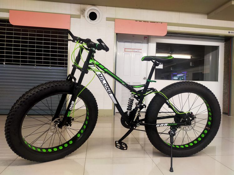 จักรยานล้อโต มีโช๊คหน้า-หลัง ดีไซน์ สวย โดดเด่น รายละเอียด 	เฟรมเหล็ก hiten 	เกียร์ ชิมาโน 21 สปีด 	มีโช๊คหน้า-หลัง 	ขอบล้ออลูแบบเจาะรู  รูปที่ 24