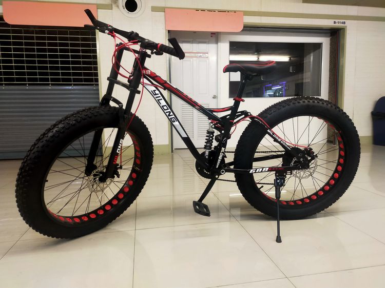 จักรยานล้อโต มีโช๊คหน้า-หลัง ดีไซน์ สวย โดดเด่น รายละเอียด 	เฟรมเหล็ก hiten 	เกียร์ ชิมาโน 21 สปีด 	มีโช๊คหน้า-หลัง 	ขอบล้ออลูแบบเจาะรู  รูปที่ 10