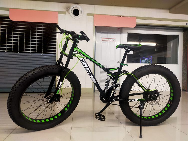 จักรยานล้อโต มีโช๊คหน้า-หลัง ดีไซน์ สวย โดดเด่น รายละเอียด 	เฟรมเหล็ก hiten 	เกียร์ ชิมาโน 21 สปีด 	มีโช๊คหน้า-หลัง 	ขอบล้ออลูแบบเจาะรู  รูปที่ 23