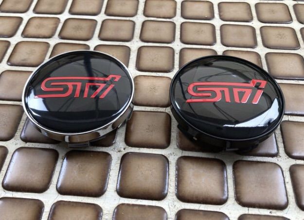 ฝาดุมล้อ SUBARU STi หน้ากว้าง 56 mm. และ 60 mm. มี 2 แบบ ขอบดำและ ขอบโครเมียม ใส่ได้กับหลายรุ่นเช่น IMPREZA FORESTER LEGACY XV รูปที่ 5