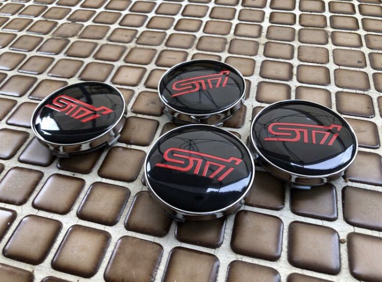 ฝาดุมล้อ SUBARU STi หน้ากว้าง 56 mm. และ 60 mm. มี 2 แบบ ขอบดำและ ขอบโครเมียม ใส่ได้กับหลายรุ่นเช่น IMPREZA FORESTER LEGACY XV รูปที่ 3