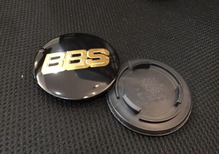ฝาดุมล้อ BBS หน้ากว้าง 7cm. โลโก้สีทอง กับ โลโก้สีเงิน ขายึดกว้าง 5.5cm.