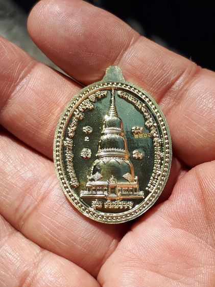 เหรียญ หลวงพ่อปลดหนี้ รุ่นวันนี้รวย วัดพระธาตุวาโย หมายเลข ๒๒๖๖ เนื้อทองทิพย์ ขนาดประมาณ​ 2.2x3.5 ซม. เหรียญมียิงเลเซอร์โค๊ต และหมายเลขทุกเห รูปที่ 10