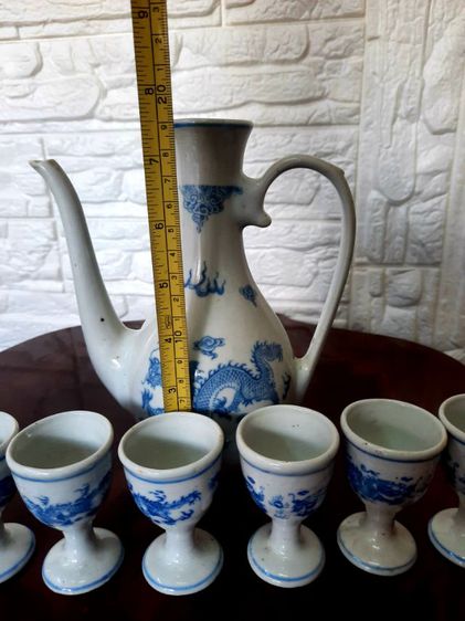 ขอขายกาน้ำชาจีนโบราณลายครามพร้อมถ้วยเล็กลายคราม 9ใบ.กาน้ำมีความสูง 19ซม.และถ้วยเล็กสูง 6.5ซม รูปที่ 13