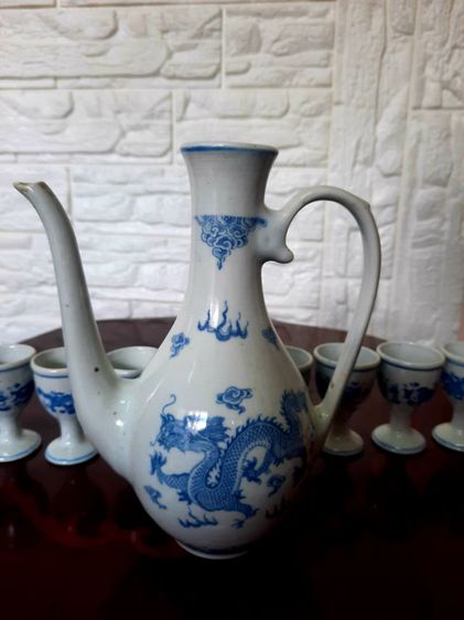 ขอขายกาน้ำชาจีนโบราณลายครามพร้อมถ้วยเล็กลายคราม 9ใบ.กาน้ำมีความสูง 19ซม.และถ้วยเล็กสูง 6.5ซม รูปที่ 16