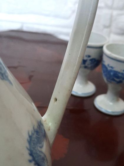 ขอขายกาน้ำชาจีนโบราณลายครามพร้อมถ้วยเล็กลายคราม 9ใบ.กาน้ำมีความสูง 19ซม.และถ้วยเล็กสูง 6.5ซม รูปที่ 10