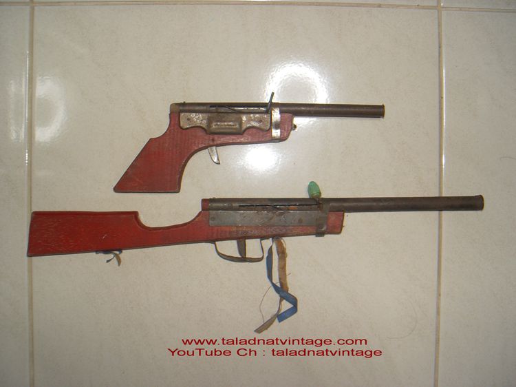ปืนอัดลมไม้โบราณ  ขายงานวัด ปืนสั้น และยาว ใช้งานได้ปกติ รูปที่ 1