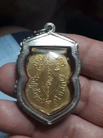 เหรียญหลวงพ่อกลั่น วัดพระญาติ ปี 2469 จ.อยุธยา รุ่นแรก เนื้อทองแดง เปียกทอง ผิวมะระ หูหัก เก่า แท้ หายาก เลี่ยมเงิน ลงยา อย่างสวย รูปที่ 10