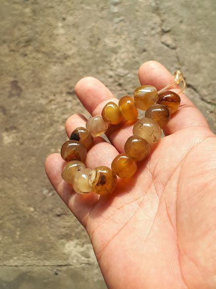 ข้อมือพลอยตาแมว หรือ พลอยไพฑูรย์ จำนวน 14 เม็ด ขนาดเม็ดใหญ่ กลมมน โปร่งใส สีสวย มีความทนทานของเนื้อพลอยนั้นยอดเยี่ยม นิยม คุณภาพดี เดิมๆ เป็ รูปที่ 5