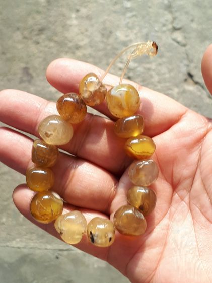 ข้อมือพลอยตาแมว หรือ พลอยไพฑูรย์ จำนวน 14 เม็ด ขนาดเม็ดใหญ่ กลมมน โปร่งใส สีสวย มีความทนทานของเนื้อพลอยนั้นยอดเยี่ยม นิยม คุณภาพดี เดิมๆ เป็ รูปที่ 8
