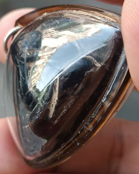 ปิดตาหลังพระราหู เนื้อผงเจุ่มรัก มีจาร พระบ้านเก่าเก็บหลายสิบปี เลี่ยมโบราณ  รูปที่ 2