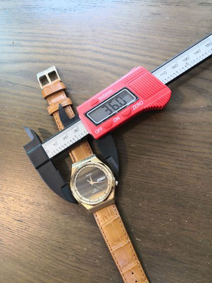 RICOH RiQuartz หน้าหินTugerEye รูปที่ 3