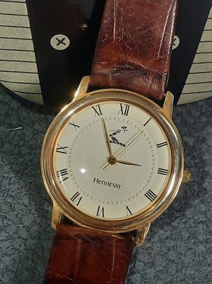 ขอขายนาฬิกาขอมือแบรนด์เนมของยี่ห้อ Hennessy เคลือบทอง 18K รหัส Y295-1521 Japan movt. quartz.ใช้ถ่านเดินตรงสภาพไม่มีเสีย รูปที่ 2