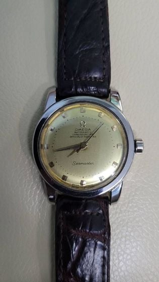 นาฬิกาข้อมือโอเมก้า ระบบโอโตเมติก รุ่น ซีสมาสเตอร์ สวิสเมท หน้าปัดทอง สายหนังแท้ลายจรเข้ Omega Automatic Chronometer Officially สภาพสวยเดิม