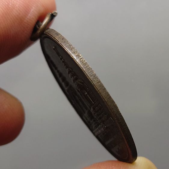 เหรียญพระบรมธาตุดอยตุง หลัง พระสิงห์หนึ่ง เนื้อทองแดงรมดำ พ.ศ.2539 รูปที่ 5