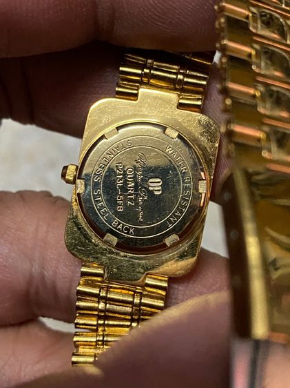 นาฬิกายี่ห้อ OLYMPIA   ควอทซ์ ของแท้มือสอง ทองสวย  สายยาว 6 นิ้วครึ่ง 650฿ รูปที่ 2