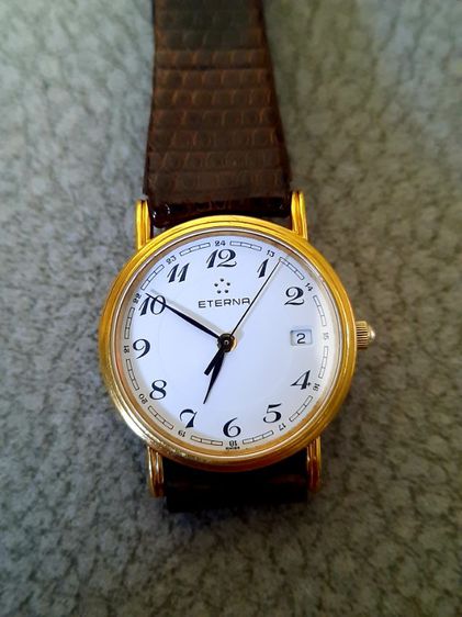 ขอขายนาฬิกาข้อมือแบรนด์เนมของยี่ห้อ Eterna classic quartz แท้ made in Swiss หน้าปัดเป็นกระจกแซฟไฟร์เครื่องแท้เดินเที่ยงตรงมีวันที่สมบูรณ์ รูปที่ 7
