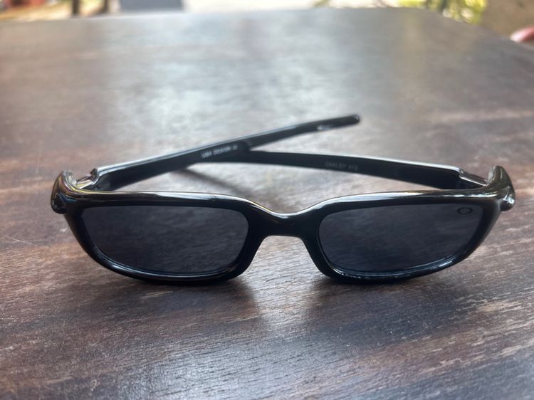 Oakley black sunglasses. รูปที่ 1