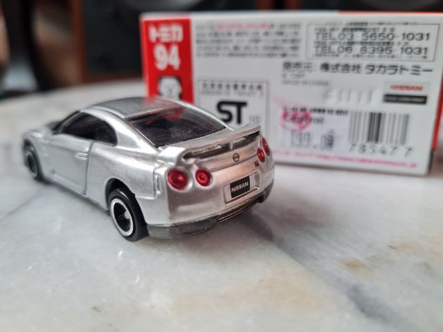Tomica Tomica No. โมเดลรถยนต์ 94 Nissan GT-R ขนาด 1:61 รถศูนย์ไทยออกเซ็นทรัล รถมือเดียวจอดเก็บสะสม ไม่ใช้ของโล๊ะจากโกดังญี่ปุ่นมือสอง รูปที่ 8
