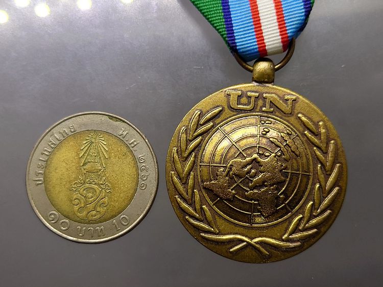 เหรียญรักษาสันติภาพของสหประชาชาติ ในกัมพูชา (UNTAC) หรือ เหรียญเชิดชูเกียรติองค์การสหประชาชาติ UN Medal รูปที่ 5