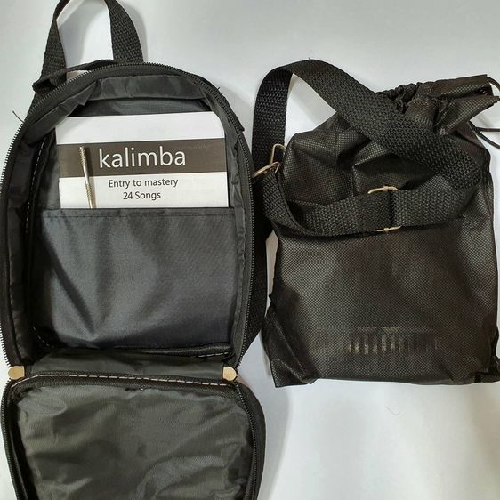 kalimba 17 คีย์ เปียโนไม้มะฮอกกานี เครื่องดนตรีสําหรับผู้เริ่มต้น คาลิมบา พร้อมกระเป๋า และไม้จูนเสียง สติ๊กเกอร์โน้ต อุปกรณ์ครบชุด รูปที่ 4