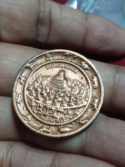 เหรียญจตุคามรามเทพ มหาเทพพระนารายณ์ รุ่น สัจจะอธิษฐาน บุโรพุทโธ (หมอลักษณ์ฟันธง) ปี 2550 (แบบหลังมหาเจดีย์บุโรพุทโธ) 
ขนาด 3.2ซม. รูปที่ 4