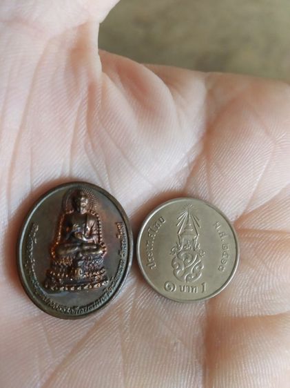 พระเหรียญเนื้อทองแดง(เหรียญสมเด็จองค์ปฐมพระพุทธภวธรรมจักรบรมมหาไตรโลกนาถหนังพระหลวงปู่เทพโลกอุดร(วัดลาดใหญ่)(จังหวัดสมุทรสาคร))พระเครื่องราง รูปที่ 6