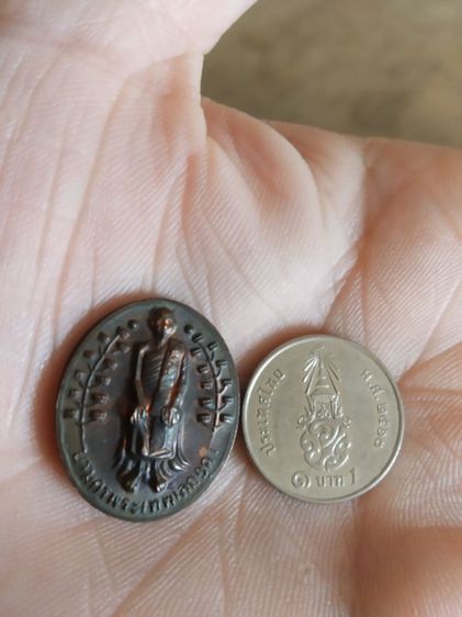 พระเหรียญเนื้อทองแดง(เหรียญสมเด็จองค์ปฐมพระพุทธภวธรรมจักรบรมมหาไตรโลกนาถหนังพระหลวงปู่เทพโลกอุดร(วัดลาดใหญ่)(จังหวัดสมุทรสาคร))พระเครื่องราง รูปที่ 16