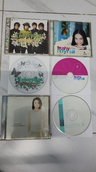 ภาษาไทย ขายแผ่นซีดี 3 อัลบั้ม 3 แผ่น เอ็นโดรฟิน อัลบั้ม สักวา49, นัทมีเรีย อัลบั้ม เฟรชชี่ มีรีย, ปนัดดา เรืองวุฒิ อัลบั้ม ดอกไม้ในหัวใจ สภาพแผ่นสวย