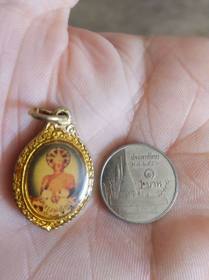 พระเหรียญ(เหรียญล็อกเก็ตพระหลวงพ่อใหญ่หลังพระนางกวักเก่า(ไม่ทราบอายุหรือพระเกจิที่สร้าง))พระบ้านพระเครื่องรางของมงคล รูปที่ 3