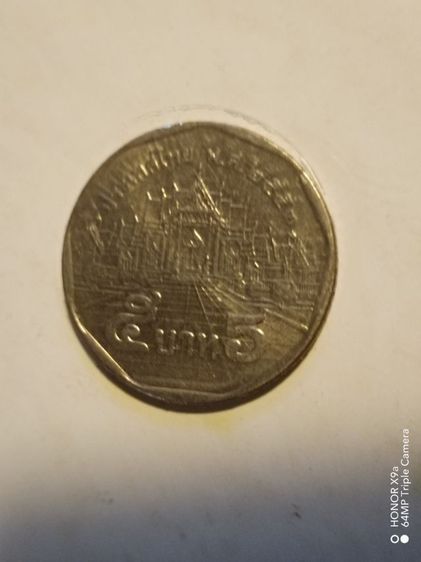 เหรียญ​ห้า​บาท​รัชกาล​ที่​๙​ปี​2553ผ่าน​การ​ใช้​ รูปที่ 4