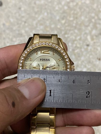 นาฬิกายี่ห้อ FOSSIL  ของแท้มือสอง สภาพสวย ทองสวย สายยาวสุด 15 เซนติเมตร  950฿ รูปที่ 7