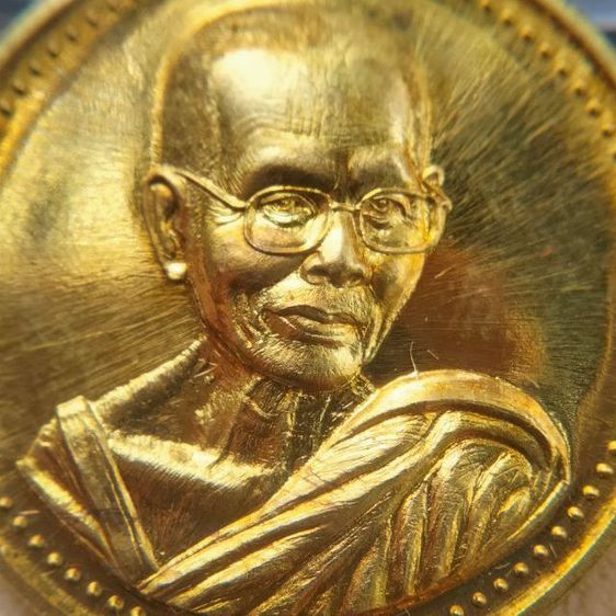 เหรียญอายุวัฒนมงคล 85 ปี หลวงปู่สังข์ สังกิจโจ วัดป่าอาจารย์ตื้อ ปี 2558

 รูปที่ 6