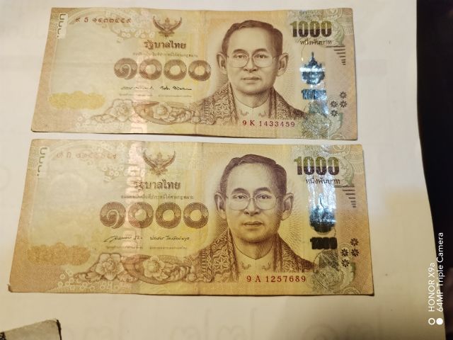 แบงก์​พัน​แบบ​16เก้าหน้าเก้าหลัง​ผ่านการใช้ รูปที่ 2