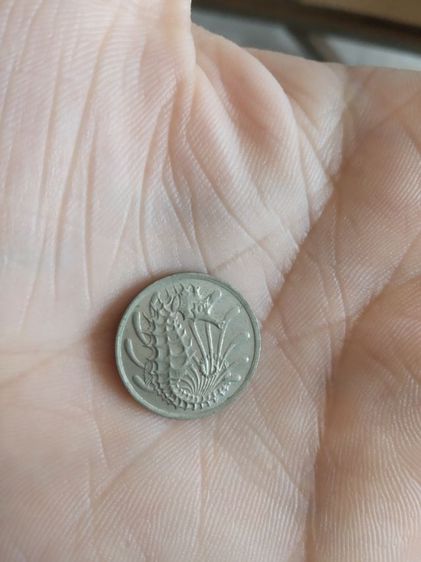 เหรียญประเทศสิงคโปร์(เป็นเหรียญสิงคโปร์ชนิด10เซนต์(เหรียญกษาปณ์ชนิดหมุนเวียน)(ถูกผลิตขึ้นในปีคริสตศักราช1982))สำหรับเอาไว้สะสมหรือโชว์ก็ได้ รูปที่ 3