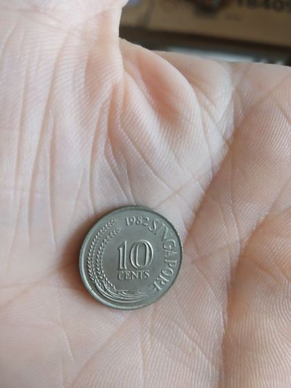 เหรียญประเทศสิงคโปร์(เป็นเหรียญสิงคโปร์ชนิด10เซนต์(เหรียญกษาปณ์ชนิดหมุนเวียน)(ถูกผลิตขึ้นในปีคริสตศักราช1982))สำหรับเอาไว้สะสมหรือโชว์ก็ได้ รูปที่ 10