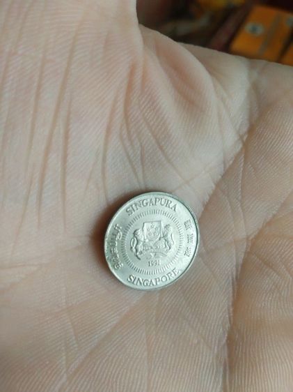 เหรียญประเทศสิงคโปร์(เหรียญประเทศสิงคโปร์ชนิด10เซนต์(เหรียญกษาปณ์ที่ใช้หมุนเวียน)(ถูกผลิตขึ้นในปีคริสตศักราช1991))สำหรับเอาไว้สะสมหรือโชว์ รูปที่ 7