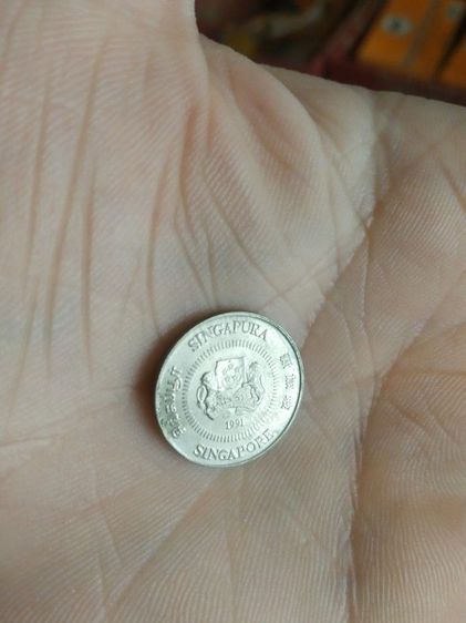 เหรียญประเทศสิงคโปร์(เหรียญประเทศสิงคโปร์ชนิด10เซนต์(เหรียญกษาปณ์ที่ใช้หมุนเวียน)(ถูกผลิตขึ้นในปีคริสตศักราช1991))สำหรับเอาไว้สะสมหรือโชว์ รูปที่ 4