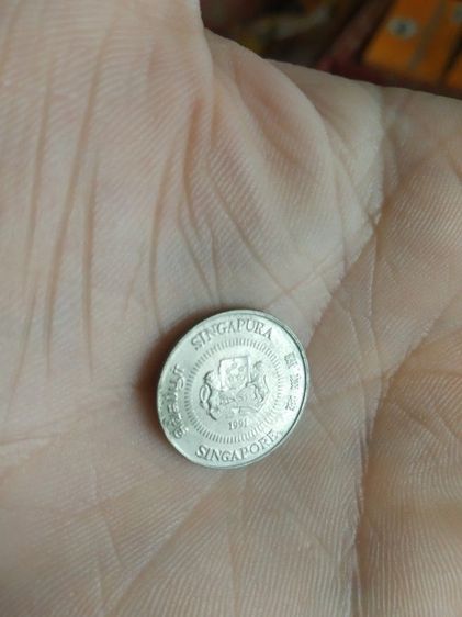 เหรียญประเทศสิงคโปร์(เหรียญประเทศสิงคโปร์ชนิด10เซนต์(เหรียญกษาปณ์ที่ใช้หมุนเวียน)(ถูกผลิตขึ้นในปีคริสตศักราช1991))สำหรับเอาไว้สะสมหรือโชว์ รูปที่ 2