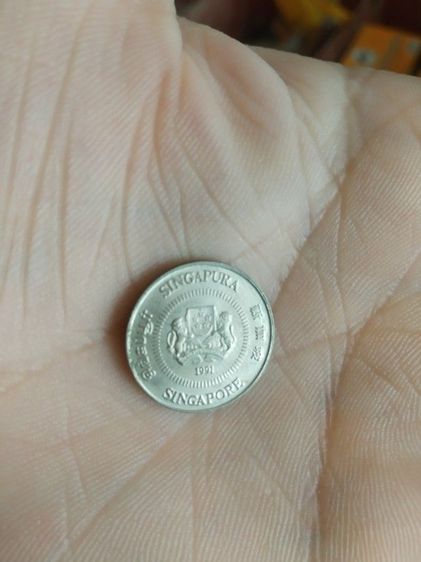 เหรียญประเทศสิงคโปร์(เหรียญประเทศสิงคโปร์ชนิด10เซนต์(เหรียญกษาปณ์ที่ใช้หมุนเวียน)(ถูกผลิตขึ้นในปีคริสตศักราช1991))สำหรับเอาไว้สะสมหรือโชว์ รูปที่ 9